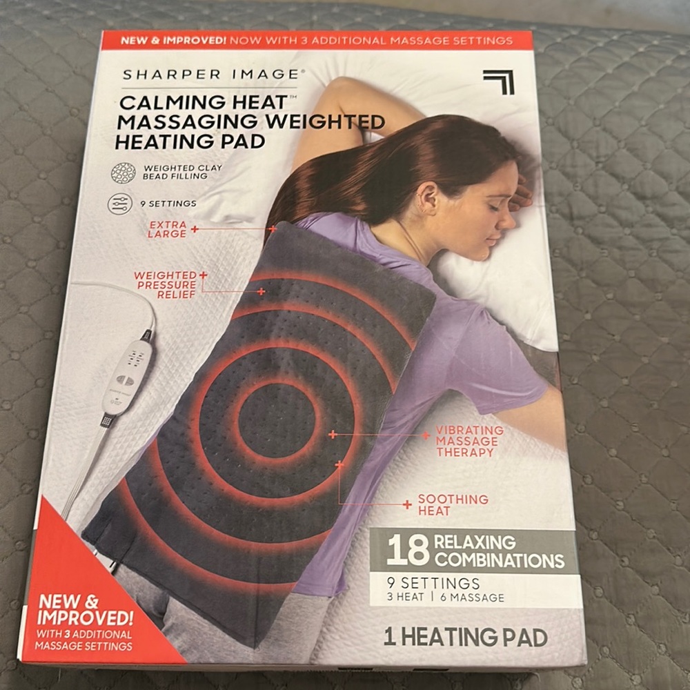 New in box Sharper Image calming heat massaging weighted heating pad
